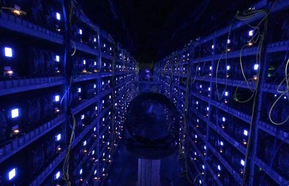 A modern ASIC miner on a secure shelf.